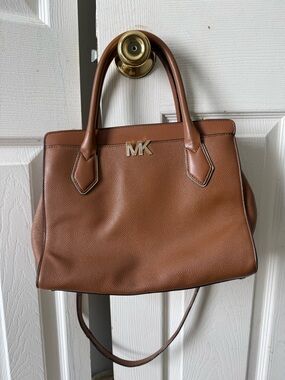 Brown Leather Michael Kors Cognac Satchel with Gold MK Logo With Shoulder Strap.